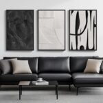 Large black and white abstract canvas wall art set with three framed minimalist prints for a modern living room.