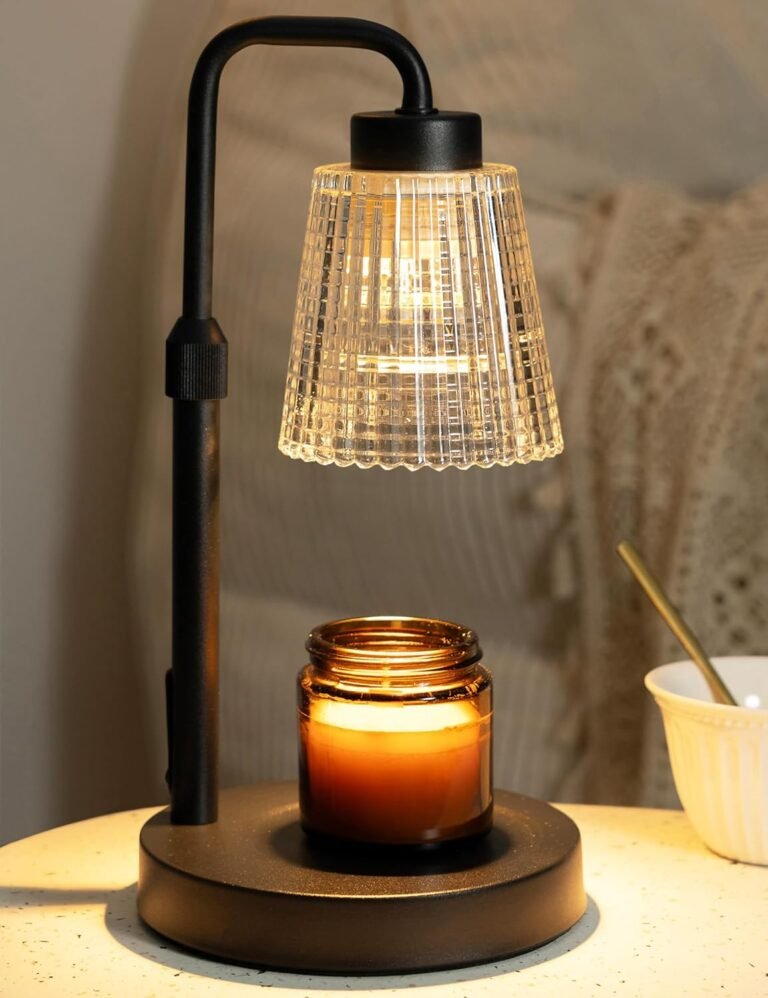 Candle warmer lamp on a bedside table creating a warm and cozy home decor atmosphere.